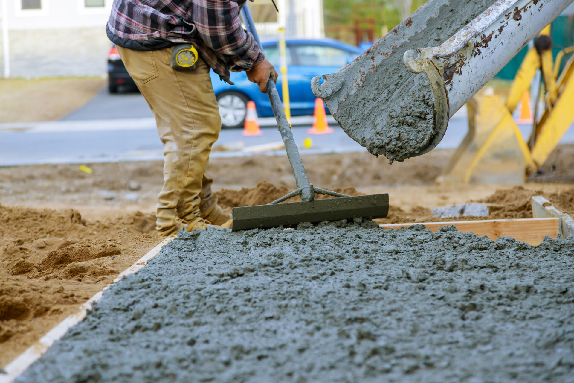 Experts levelling poured concrete in Calgary